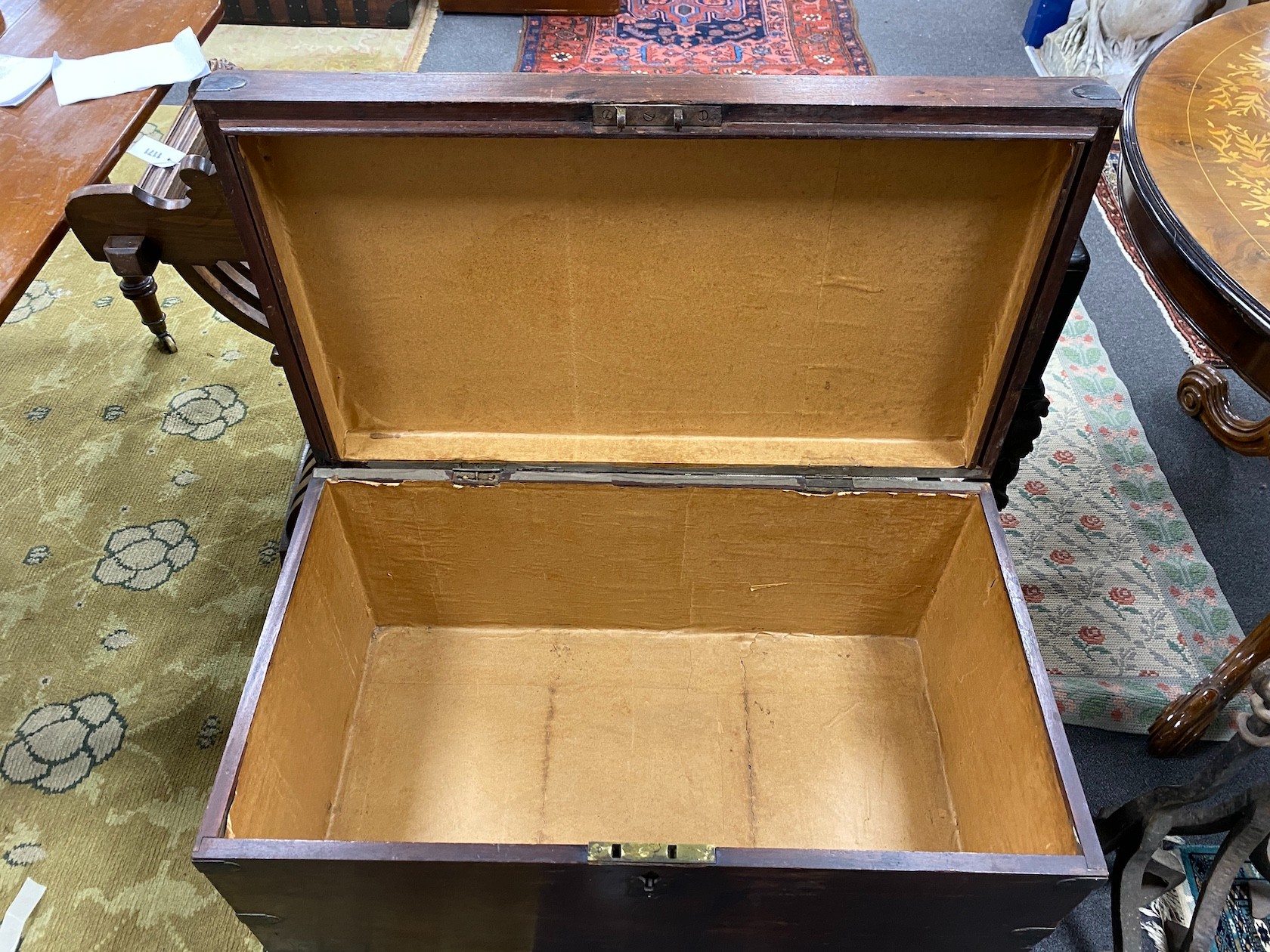 An early 19th century mahogany trunk, width 91cm, depth 52cm, height 52cm